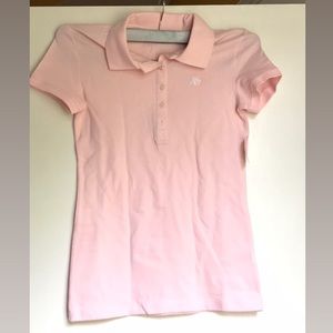 Pink shirt.